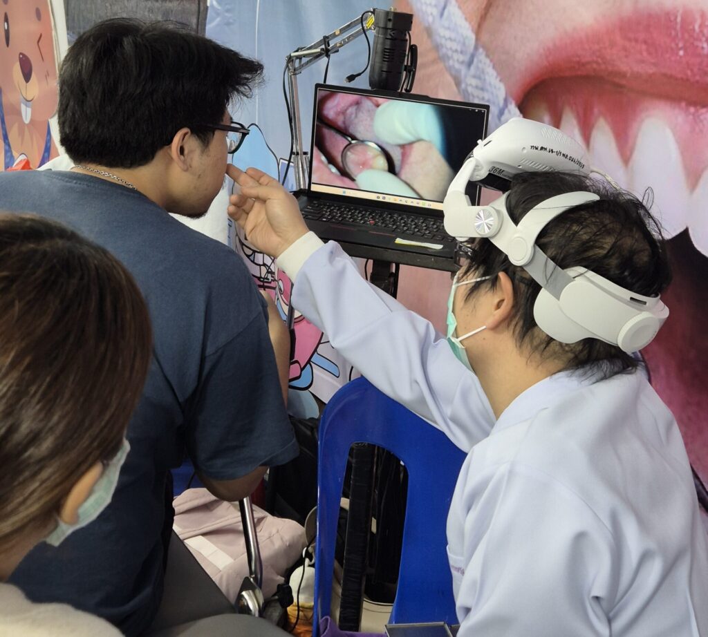 Thammasat Professor consulting with patient using arLoupe